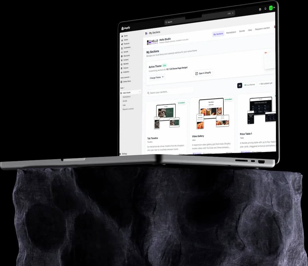 Hello Studio's My Sections screen in the Shopify admin, on a laptop standing on a stone pedestal